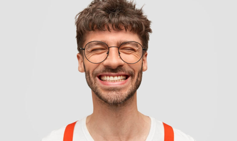 A man smiling. Combining Rhinoplasty with Dentistry in Turkey